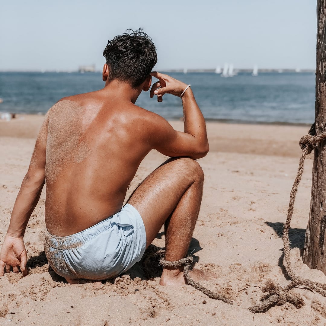 bronzage homme dos